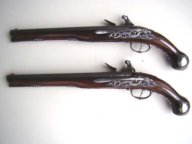 A pair of late 17th century Italian steel mounted flintlock officers' pistols circa 1695 — image 2